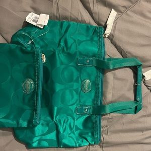 Small Coach tote with snap in pouch